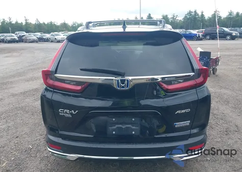 2021 Honda Cr-V Hybrid Touring z USA, uszkodzony, nr VIN 7FART6H94ME035608